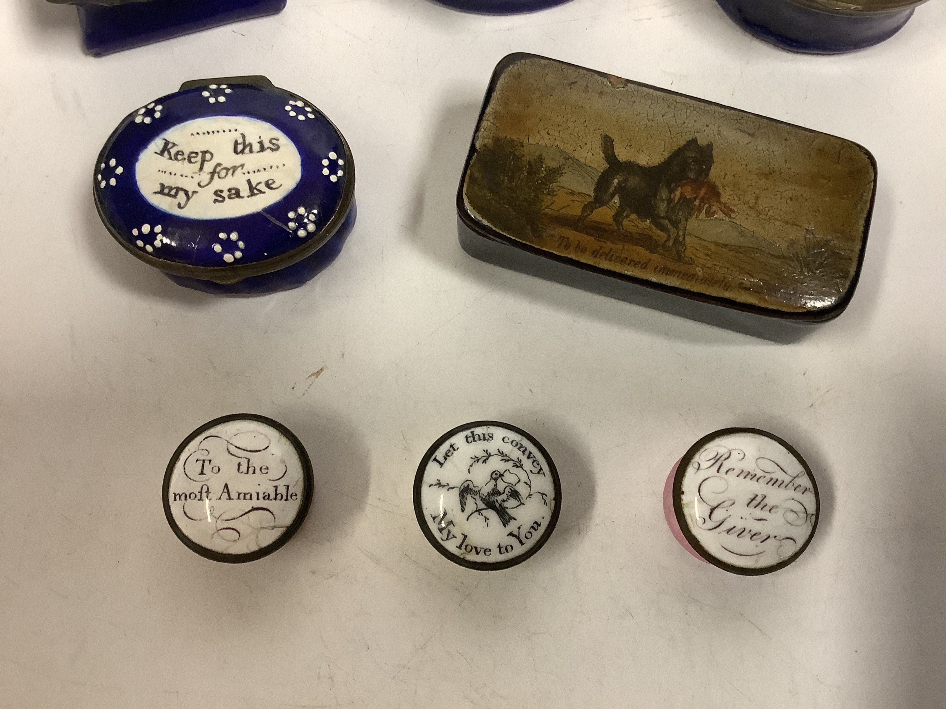 Two South Staffordshire enamel sweetheart patch boxes and two similar snuff boxes, three South Staffordshire enamel pill boxes, all late 18th/early 19th century, South Staffordshire enamel cup and associated cover and a